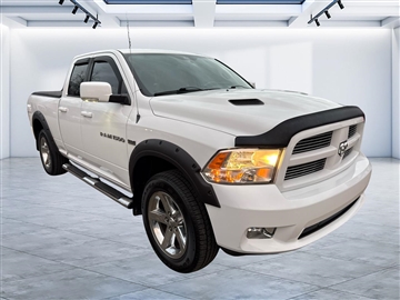 2012 RAM 1500 4WD Quad Cab 140.5" Sport