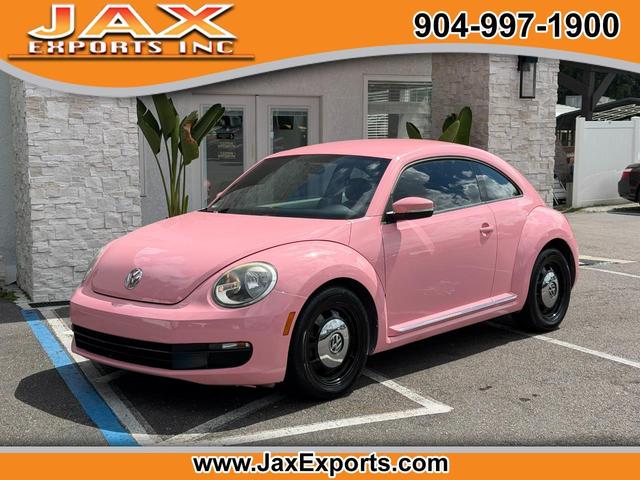 Pink 2013 Volkswagen Beetle Hatchback Front-Wheel Drive Automatic