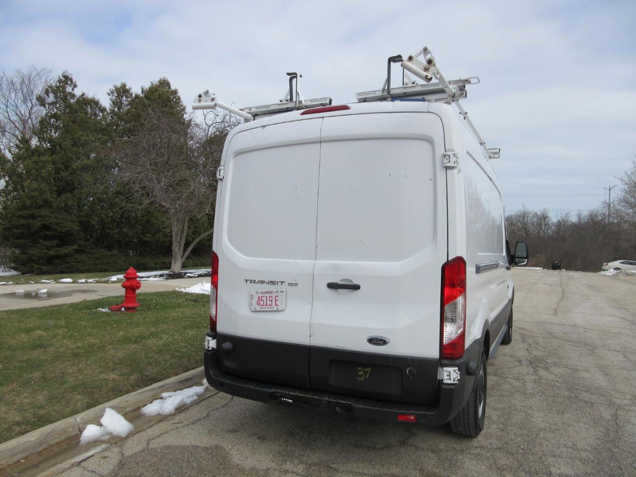 Ford Transit 150 Van Med. Roof w/Sliding Pass. 148-in. WB 2015