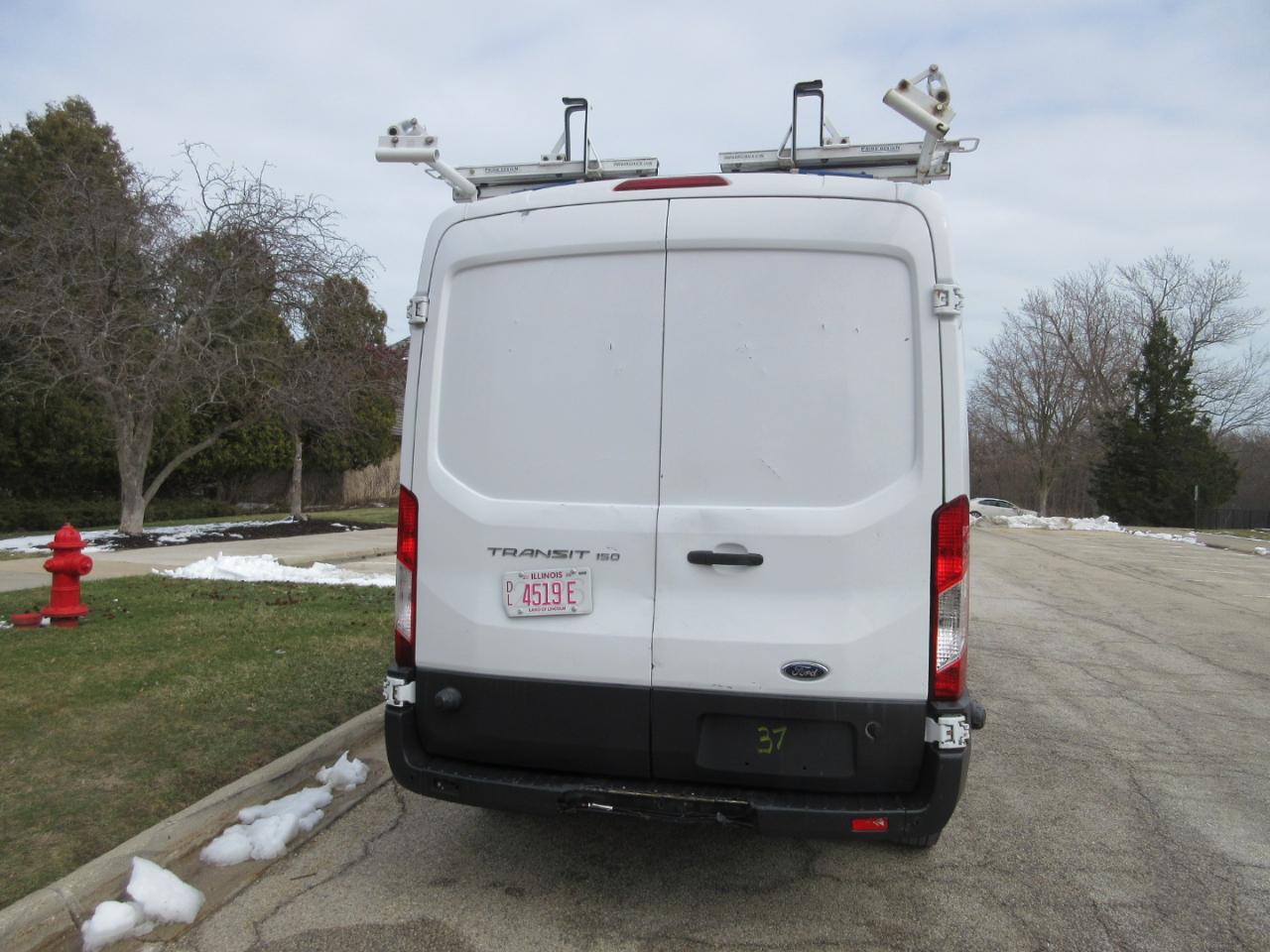 Ford Transit 150 Van Med. Roof w/Sliding Pass. 148-in. WB 2015