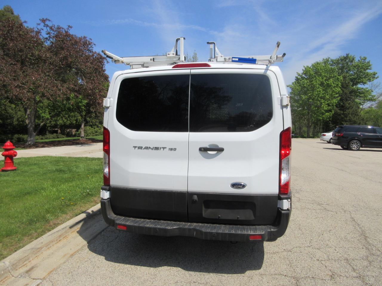 Ford Transit Van T-150 130" Low Rf 8600 GVWR Swing-Out RH Dr 2019