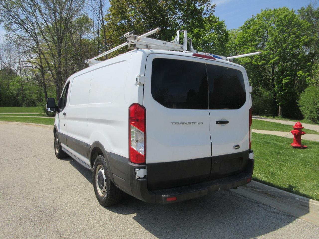 Ford Transit Van T-150 130" Low Rf 8600 GVWR Swing-Out RH Dr 2019