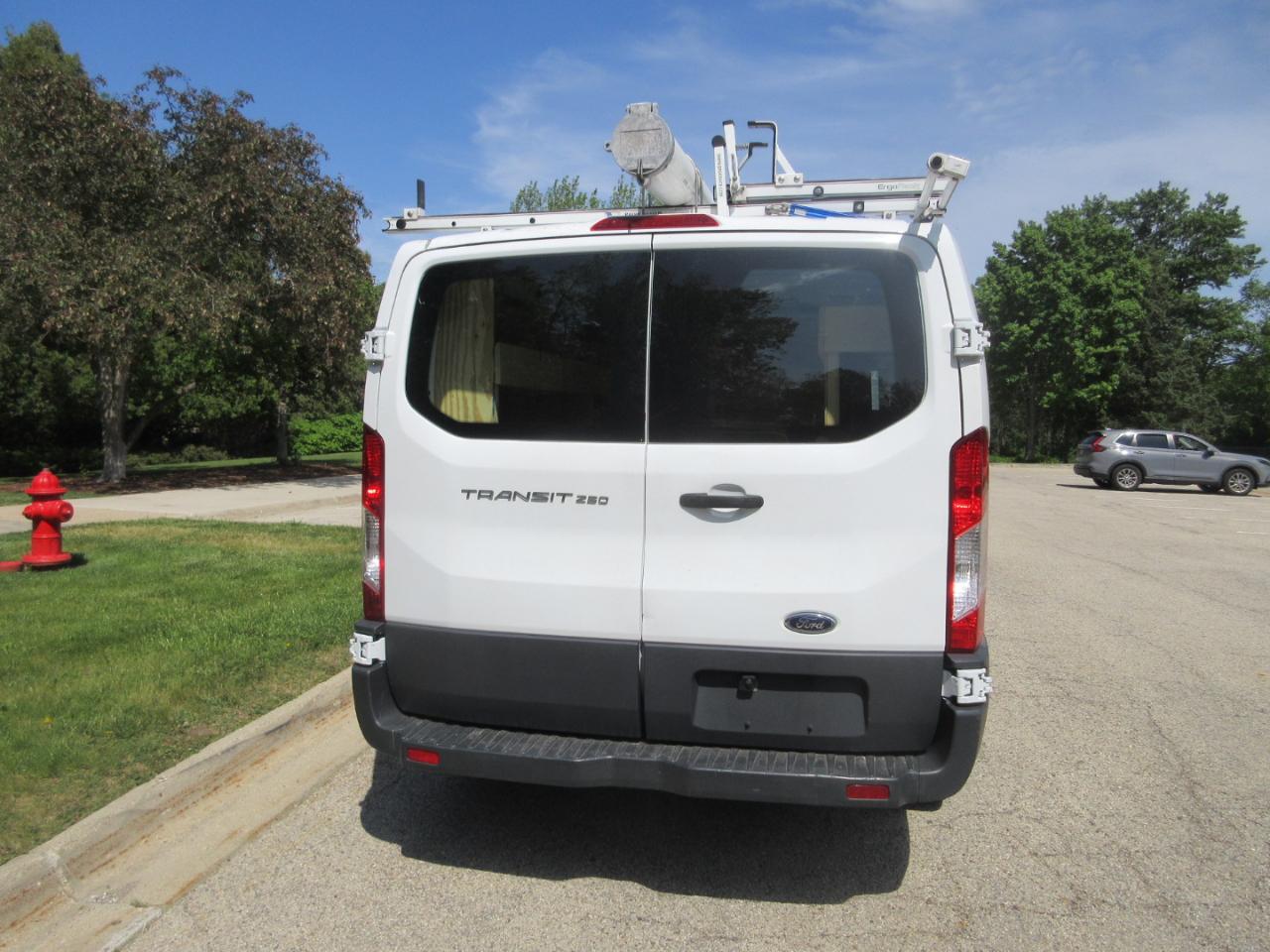 Ford Transit Cargo Van T-250 130" Low Rf 9000 GVWR Swing-Out RH Dr 2015