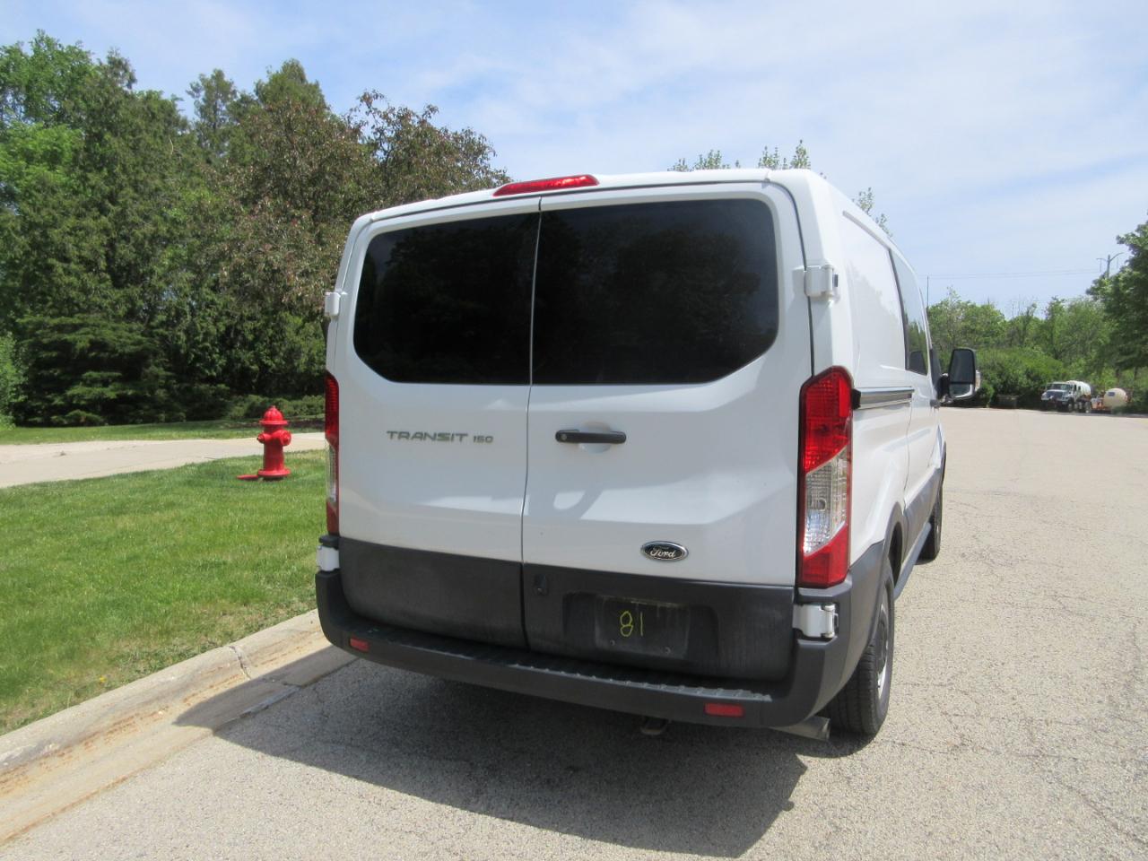 Ford Transit Cargo Van T-150 130" Low Rf 8670 GVWR RWD 2023