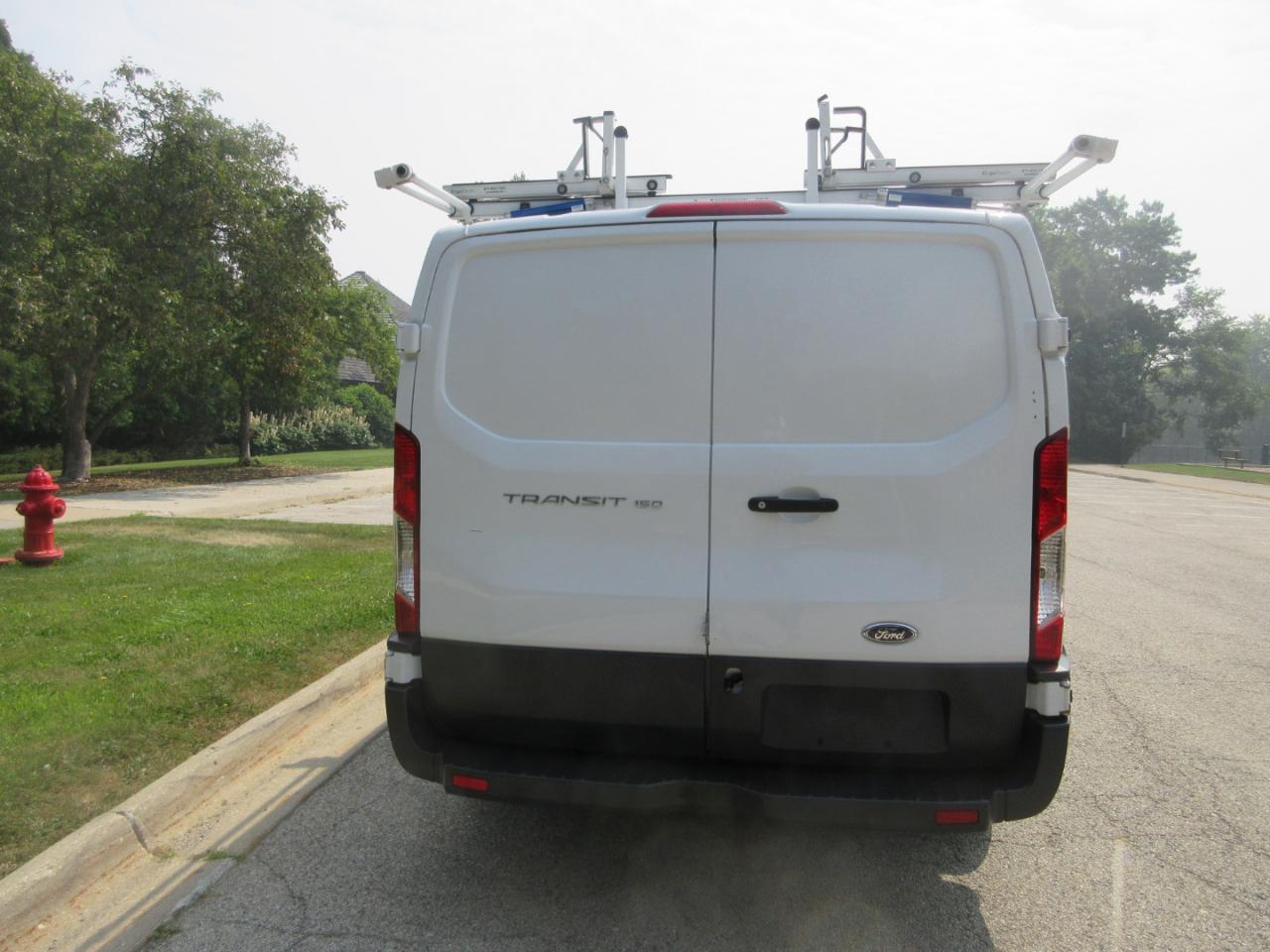 Ford Transit Van T-150 130" Low Rf 8600 GVWR Swing-Out RH Dr 2018