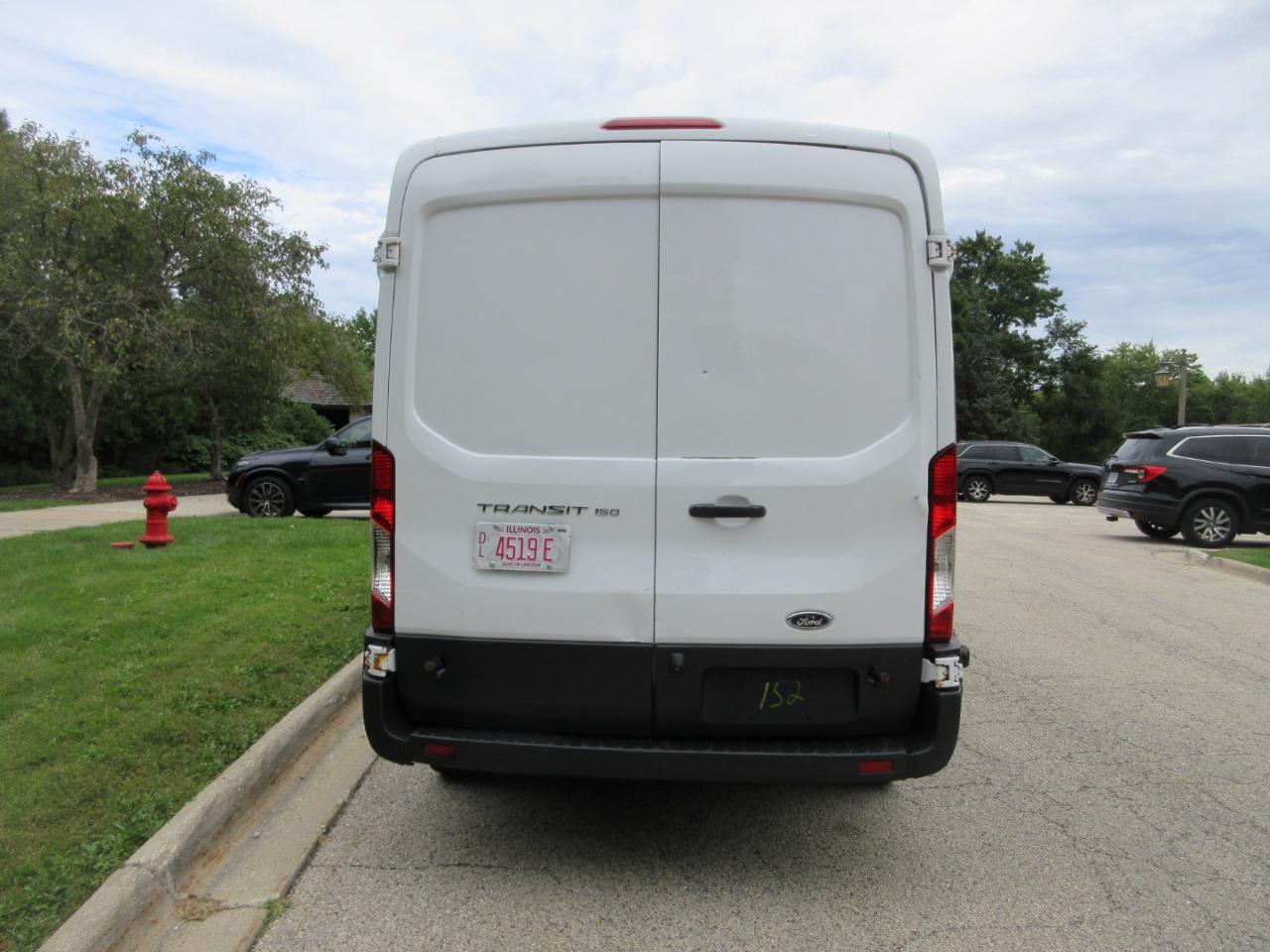 Ford Transit Cargo Van T-150 148" Med Rf 8600 GVWR Sliding RH Dr 2016