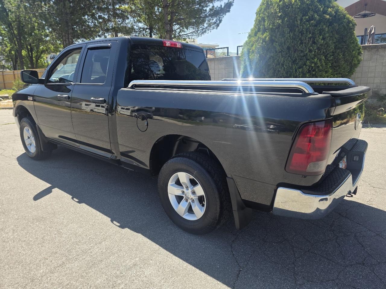 RAM 1500 4WD Quad Cab 140.5" ST 2015