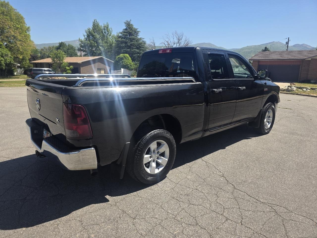 RAM 1500 4WD Quad Cab 140.5" ST 2015