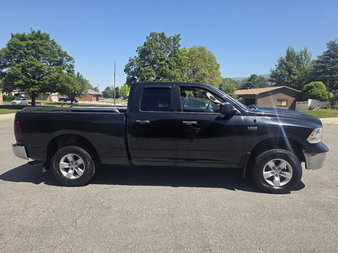 RAM 1500 4WD Quad Cab 140.5" ST 2015