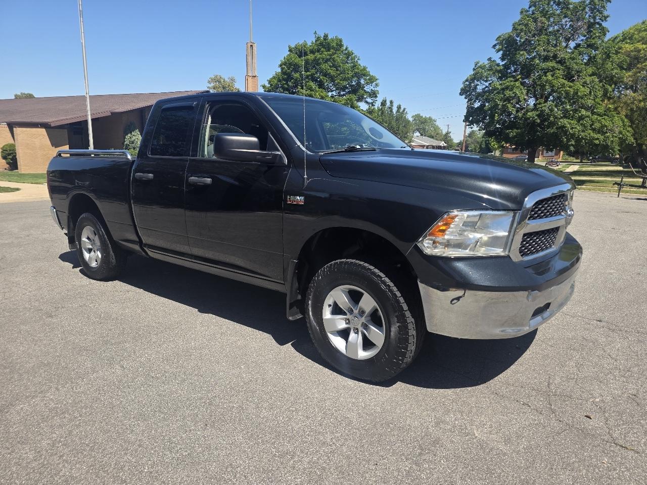 RAM 1500 4WD Quad Cab 140.5" ST 2015