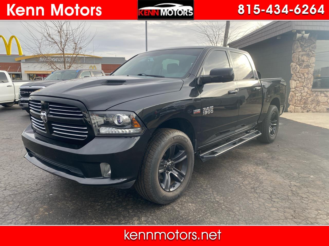 2015 RAM 1500 4WD Crew Cab 140.5" Sport