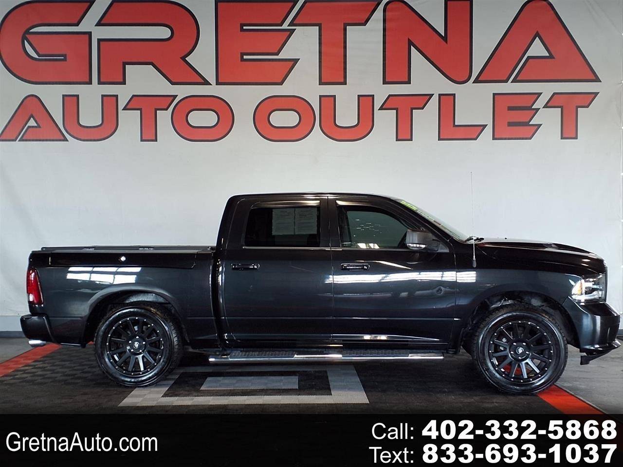 2015 RAM 1500 4WD Crew Cab 140.5" Sport