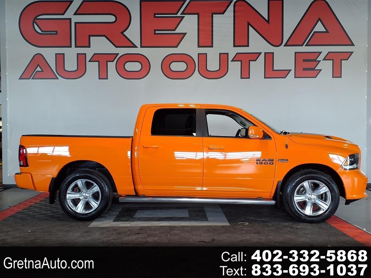 2015 RAM 1500 4WD Crew Cab 140.5" Sport