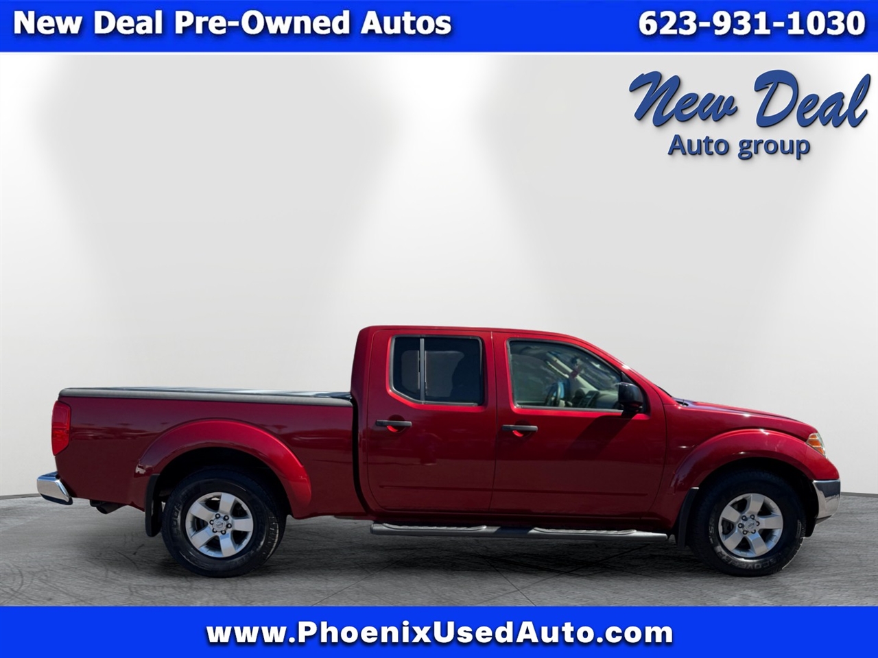 2011 Nissan Frontier Crew Cab LE photo 2