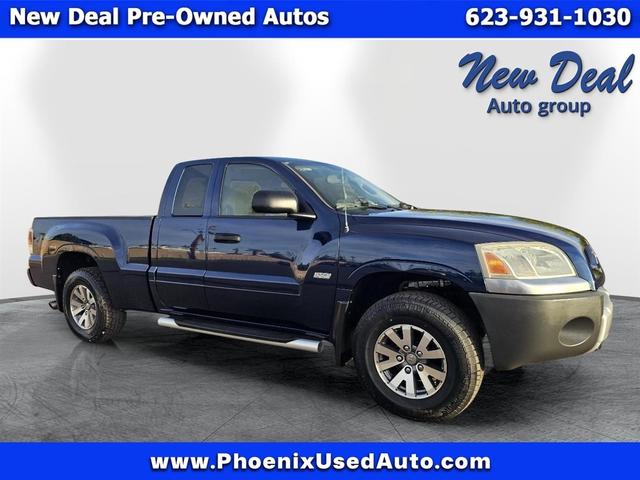 Blue 2006 Mitsubishi Raider Duro Cross V8 4dr Extended Cab 4WD SB Pickup Truck Four-Wheel Drive Automatic