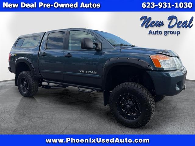 Blue 2013 Nissan Titan Pickup Truck Four-Wheel Drive Automatic