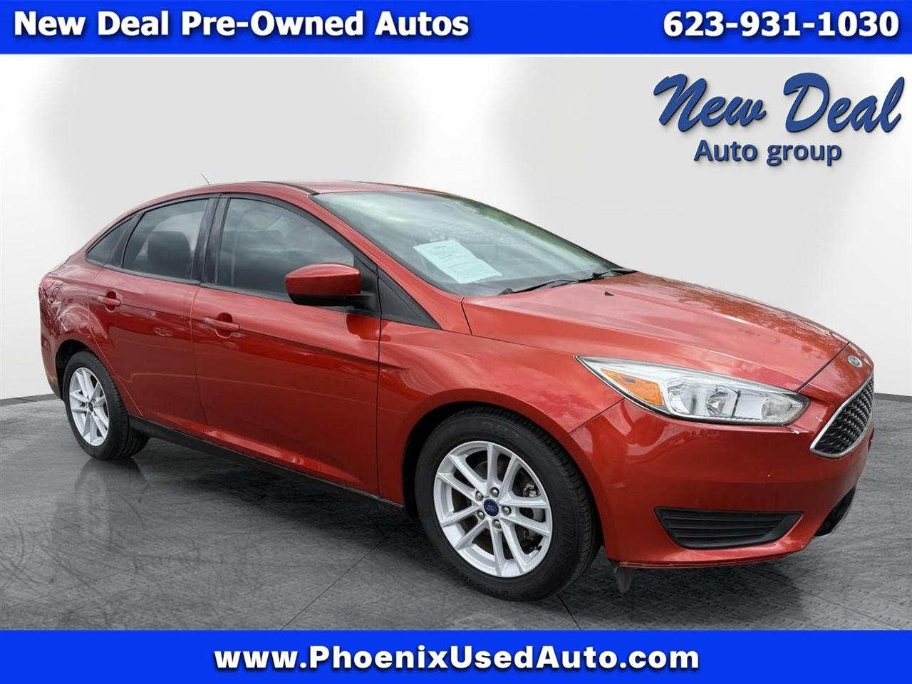 Orange 2018 Ford Focus Sedan Front-Wheel Drive Automatic