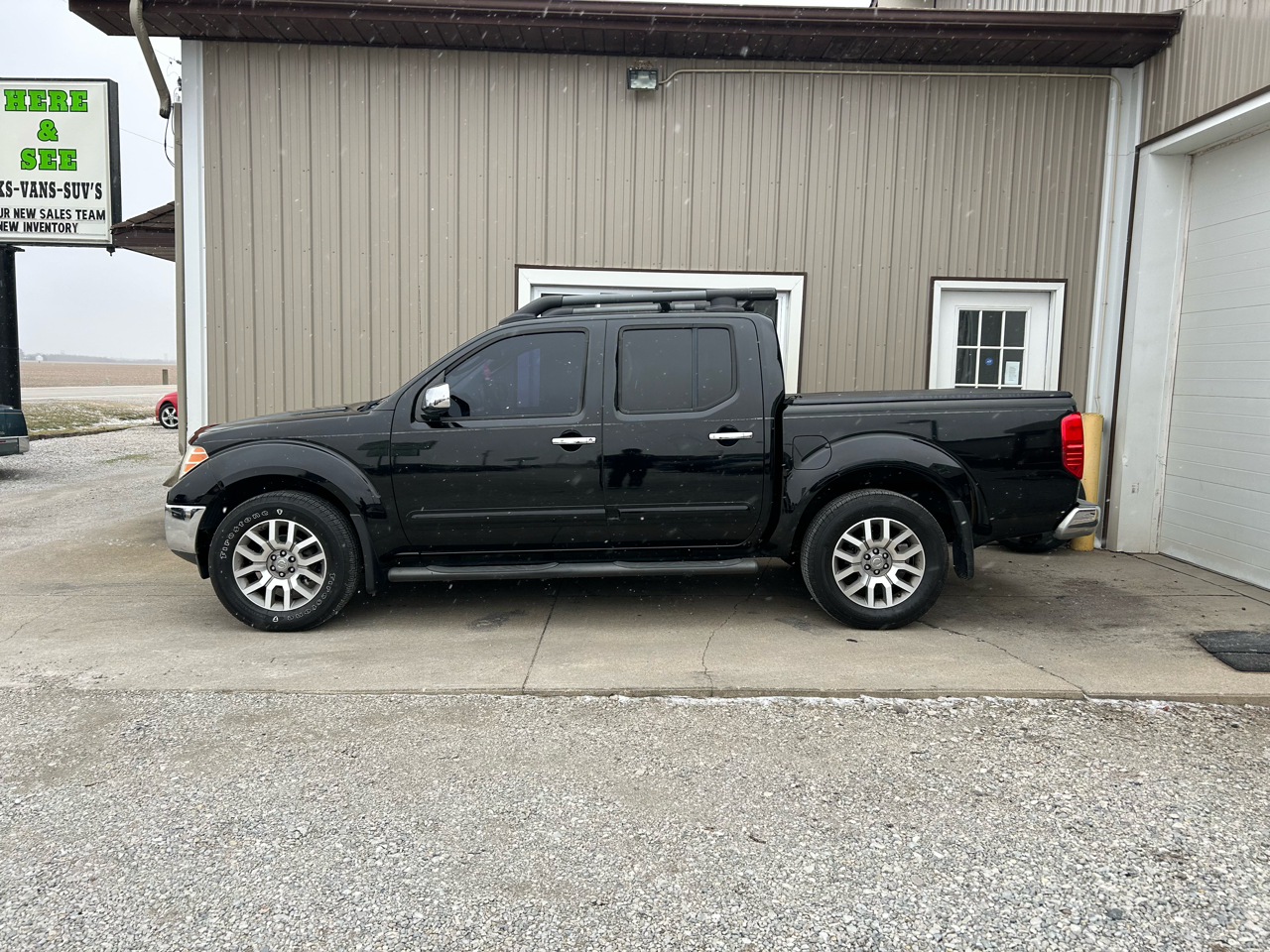 2011 Nissan Frontier 4WD Crew Cab LWB Auto SL