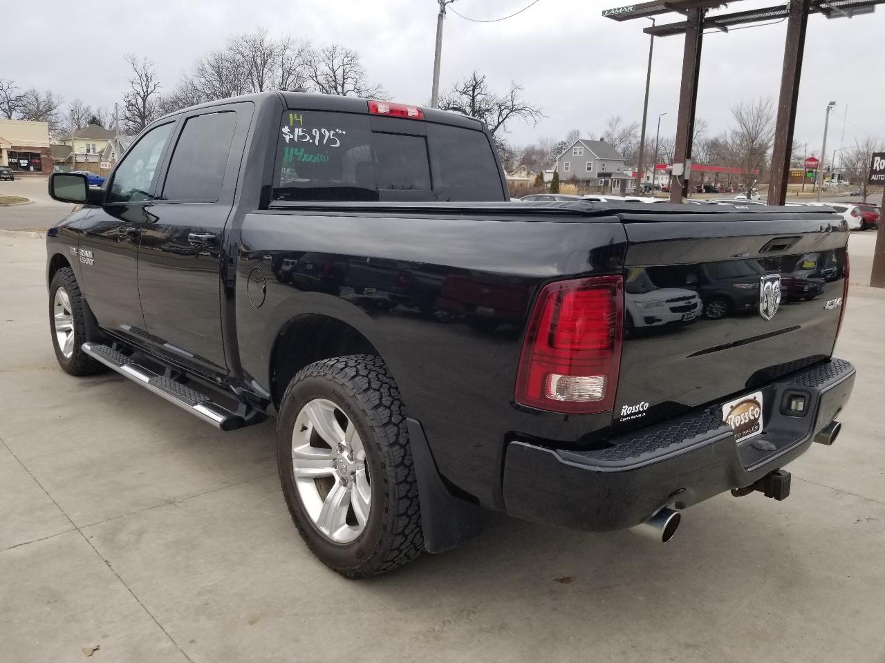 RAM 1500 4WD Crew Cab 140.5" Sport 2014