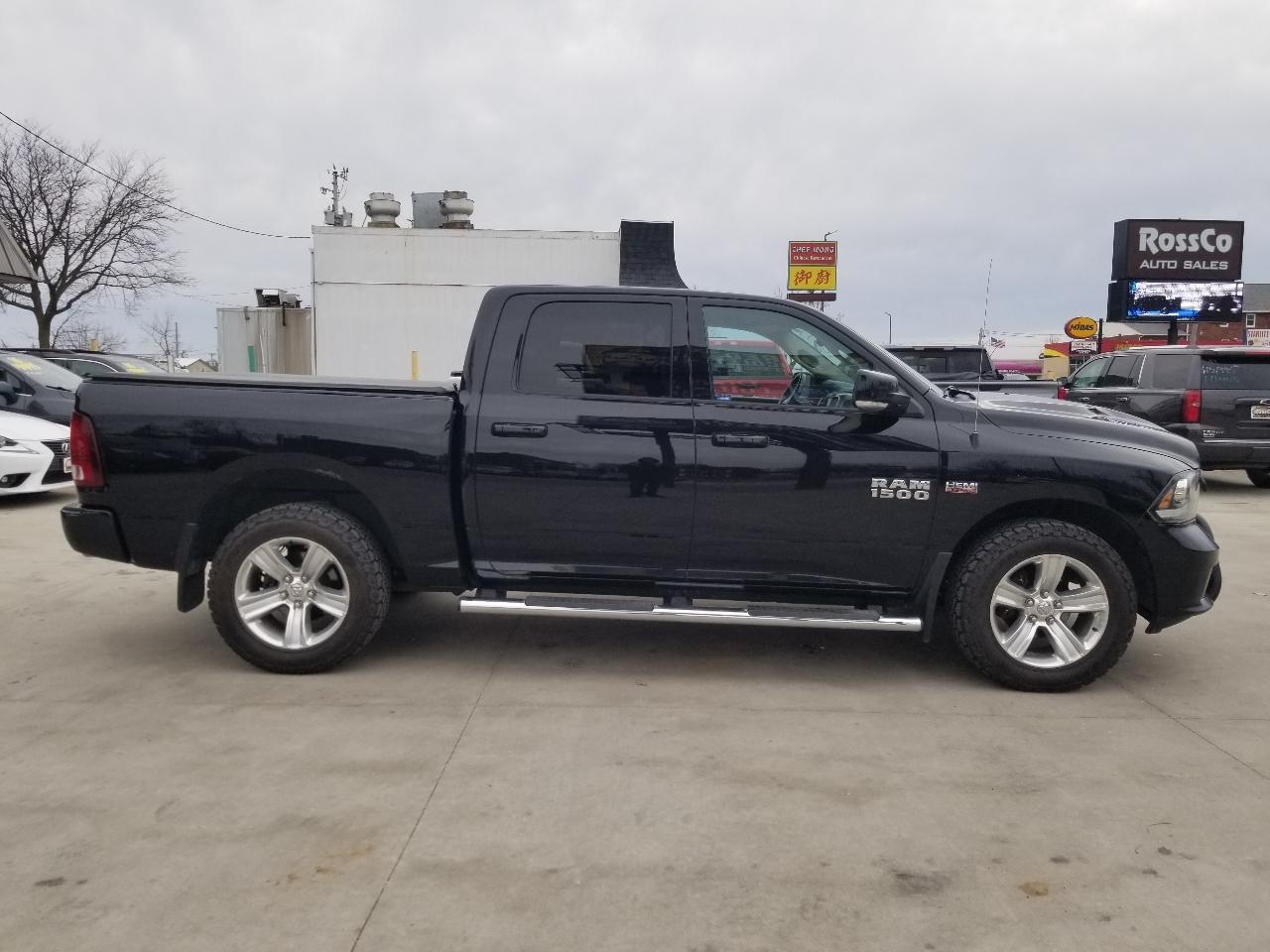 RAM 1500 4WD Crew Cab 140.5" Sport 2014