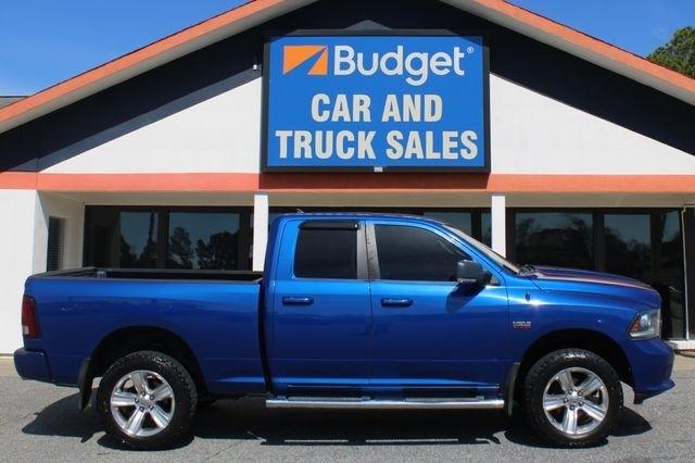 RAM 1500 4WD Quad Cab 140.5" Sport 2014