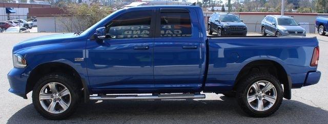 RAM 1500 4WD Quad Cab 140.5" Sport 2014