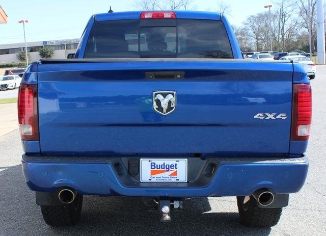 RAM 1500 4WD Quad Cab 140.5" Sport 2014