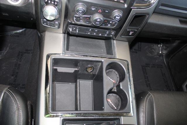 RAM 1500 4WD Quad Cab 140.5" Sport 2014