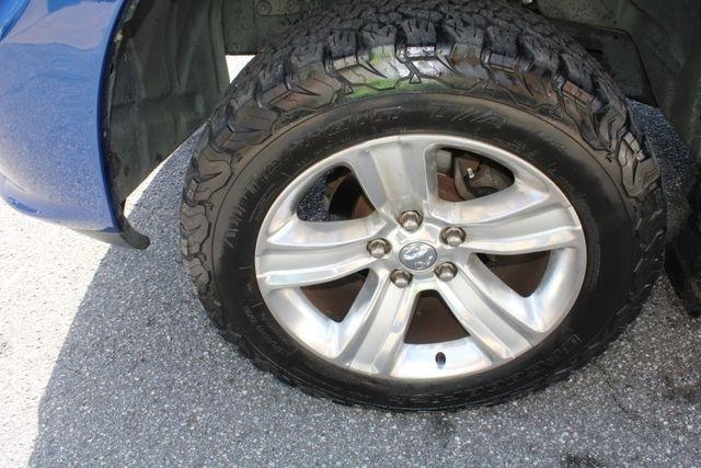 RAM 1500 4WD Quad Cab 140.5" Sport 2014