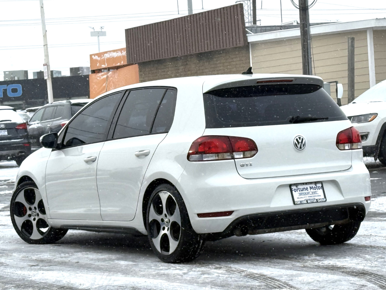 Volkswagen GTI 4dr HB DSG w/Sunroof & Navi PZEV 2012