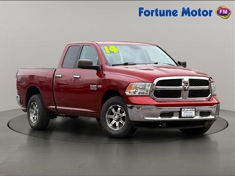 2014 RAM 1500 4WD Quad Cab 140.5" SLT