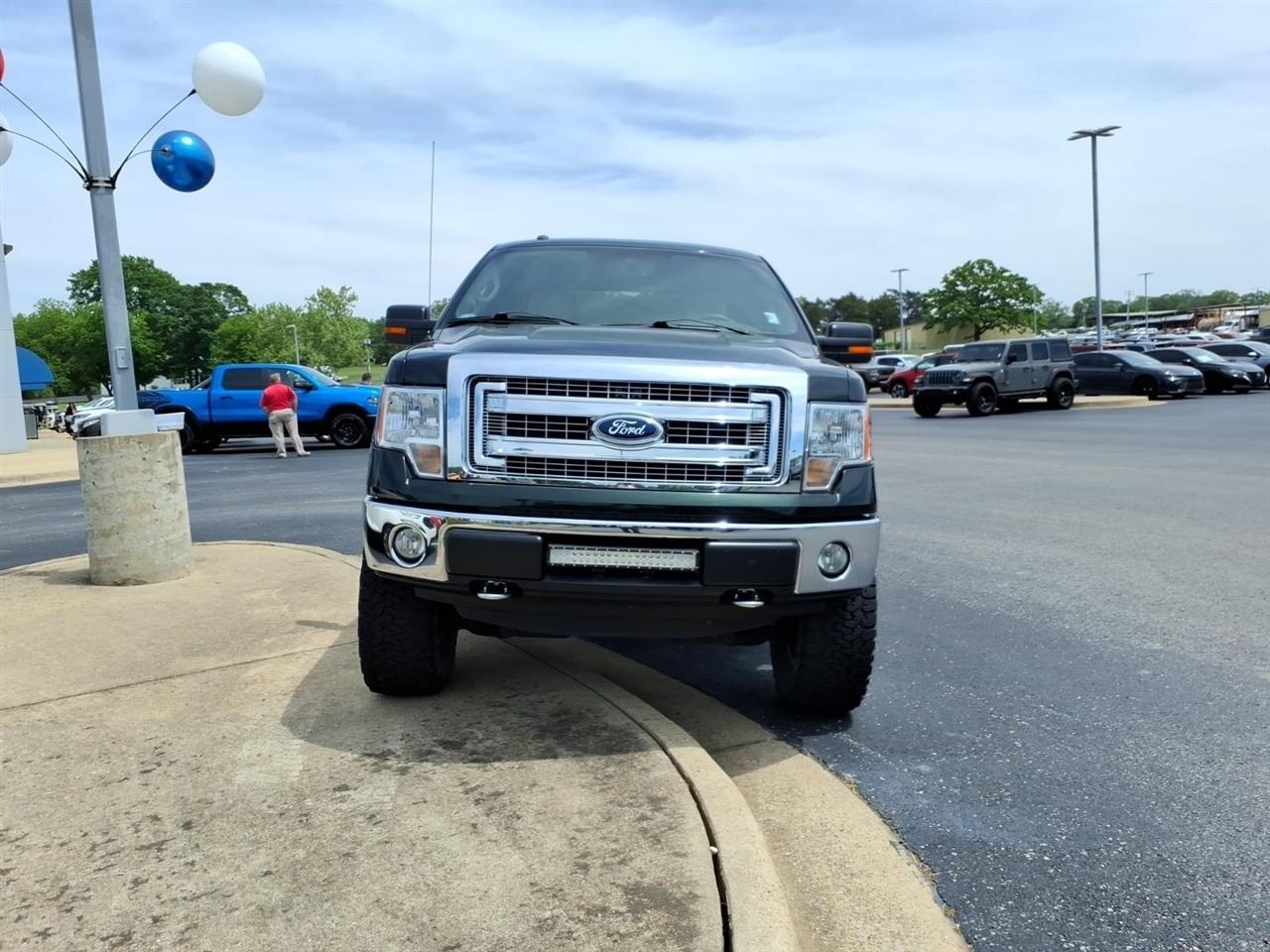 Used 2014 Ford F-150 XLT with VIN 1FTFW1EF3EKD59494 for sale in Little Rock