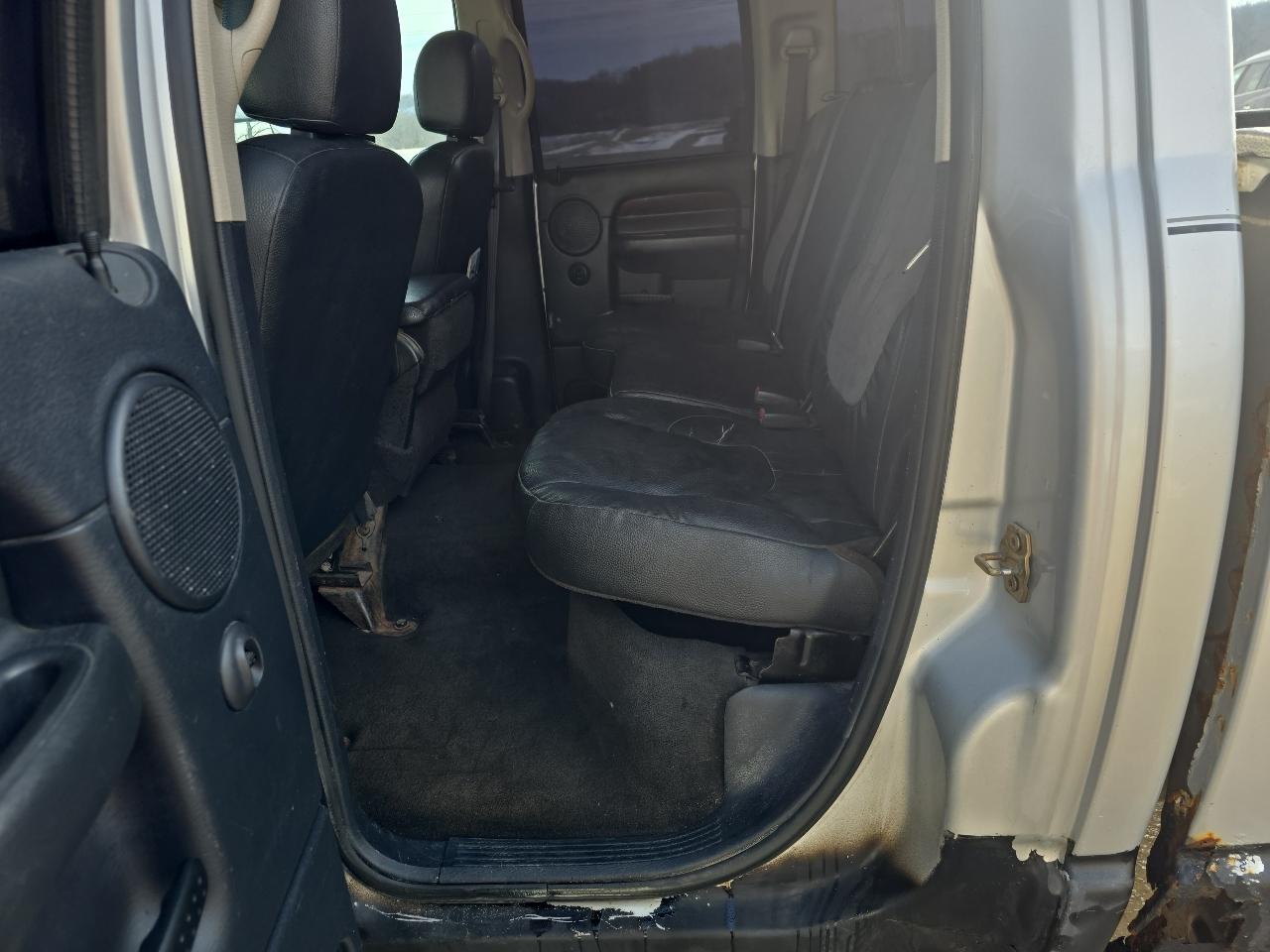 Dodge Ram 3500 4dr Quad Cab 140.5" WB 4WD SRW SLT 2003