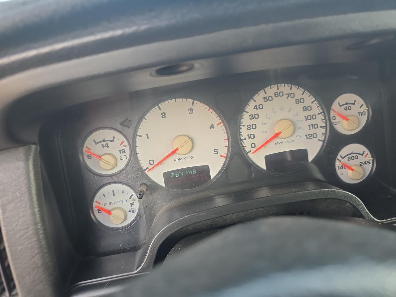 Dodge Ram 3500 4dr Quad Cab 140.5" WB 4WD SRW SLT 2003