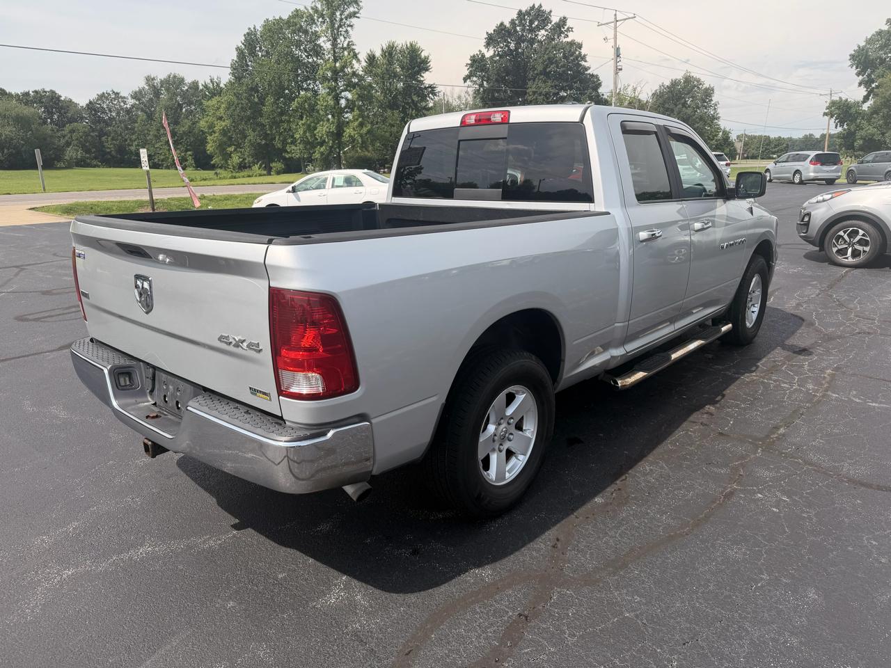 RAM 1500 4WD Quad Cab 140.5" SLT 2011