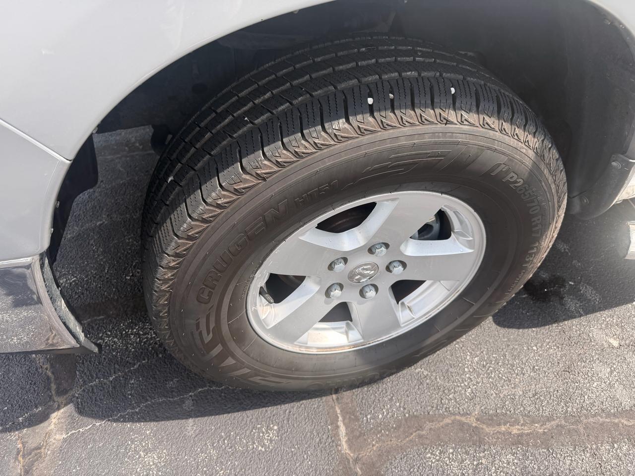 RAM 1500 4WD Quad Cab 140.5" SLT 2011