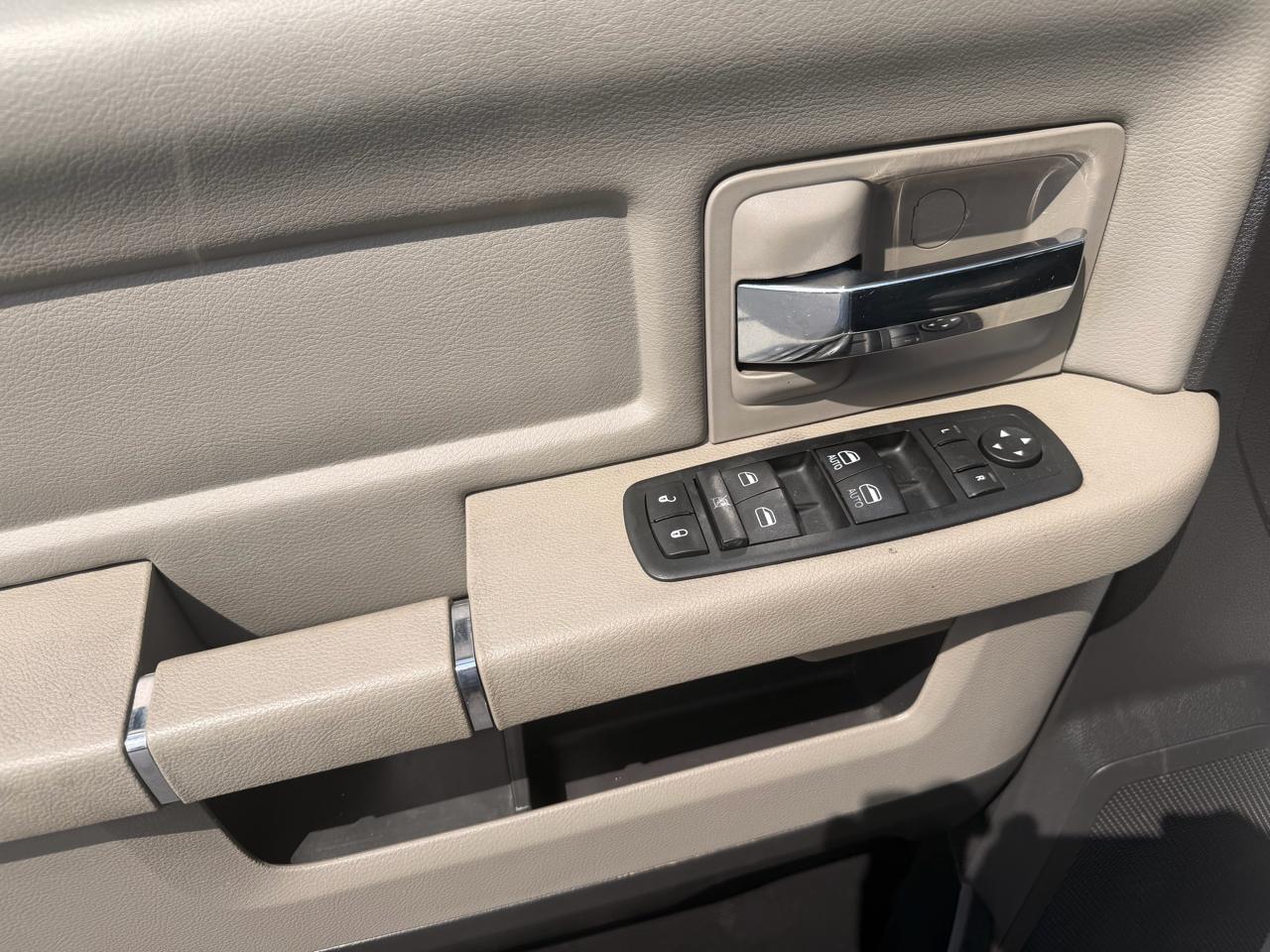 RAM 1500 4WD Quad Cab 140.5" SLT 2011