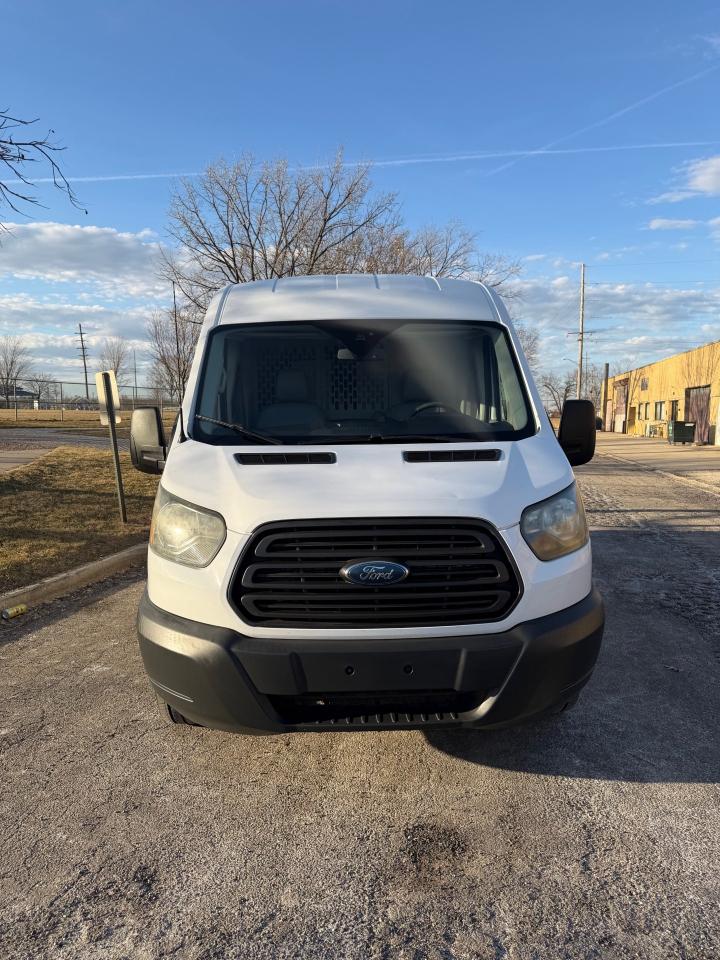 Ford Transit 150 Van Med. Roof w/Sliding Pass. 148-in. WB 2016