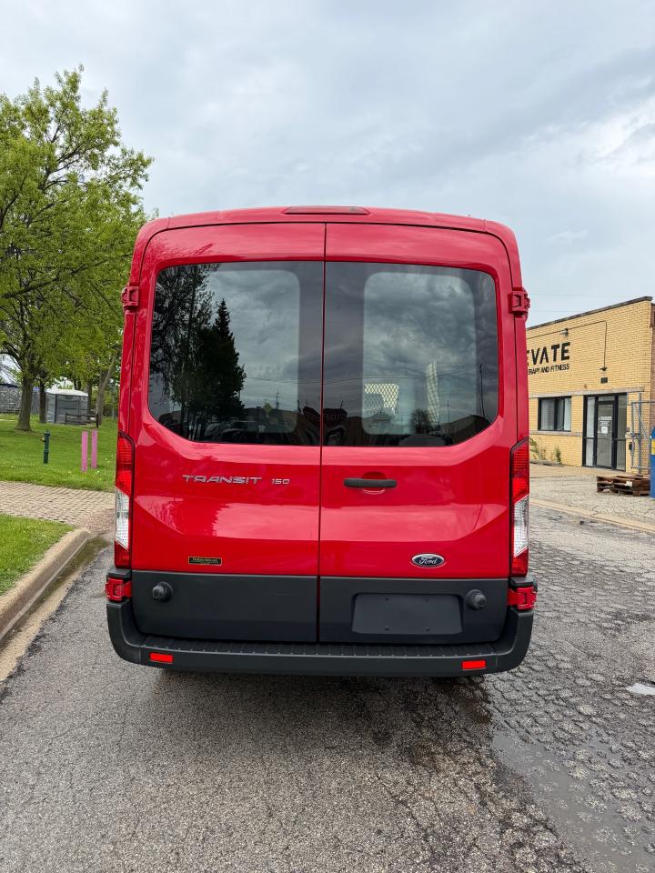 Ford Transit 150 Van Med. Roof w/Sliding Pass. 148-in. WB 2015