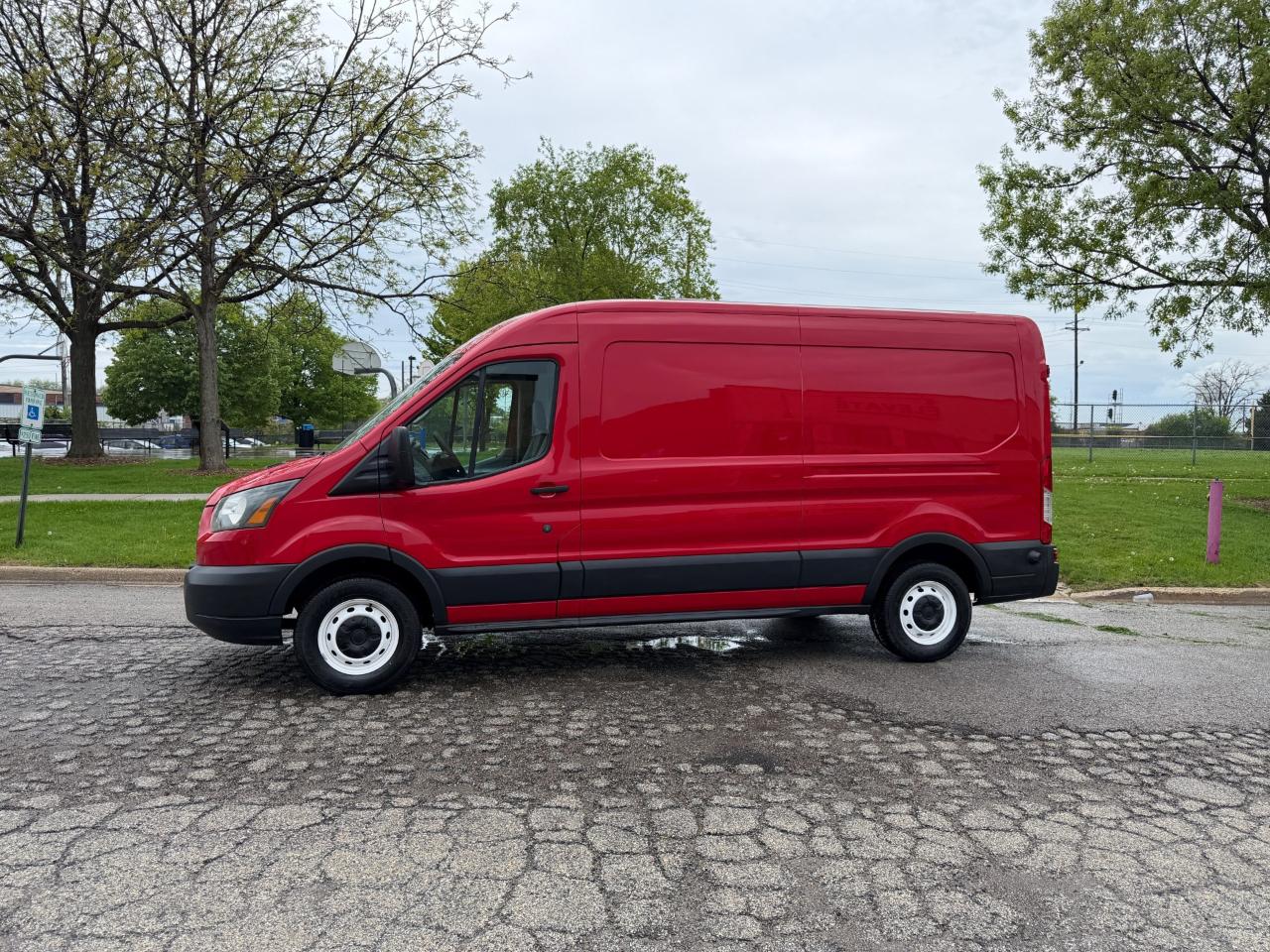 Ford Transit 150 Van Med. Roof w/Sliding Pass. 148-in. WB 2015
