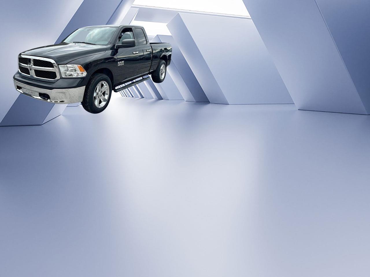 RAM 1500 4WD Quad Cab 140.5" SLT 2016