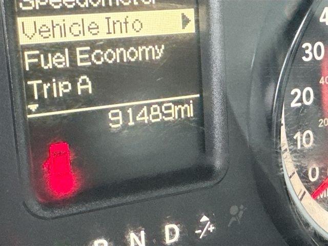 RAM 1500 4WD Quad Cab 140.5" SLT 2016