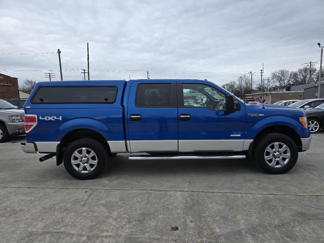 View vehicle photo 3