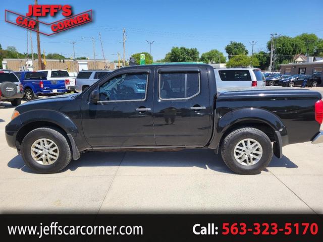Black 2014 Nissan Frontier SL Crew Cab 4WD Pickup Truck Four-Wheel Drive Automatic