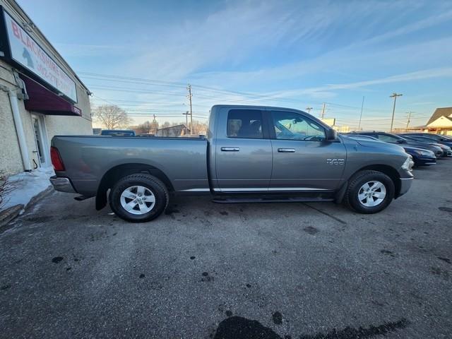 RAM 1500 4WD Quad Cab 140.5" SLT 2013