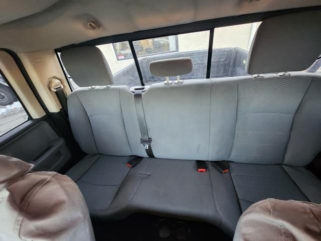 RAM 1500 4WD Quad Cab 140.5" SLT 2013