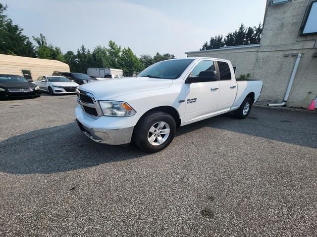 RAM 1500 4WD Quad Cab 140.5" SLT 2016