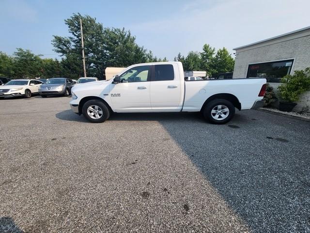 RAM 1500 4WD Quad Cab 140.5" SLT 2016