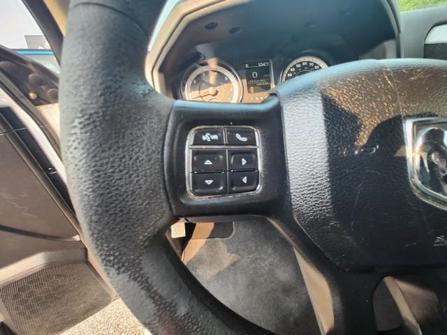 RAM 1500 4WD Quad Cab 140.5" SLT 2016