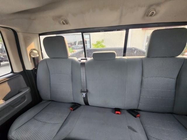 RAM 1500 4WD Quad Cab 140.5" SLT 2016